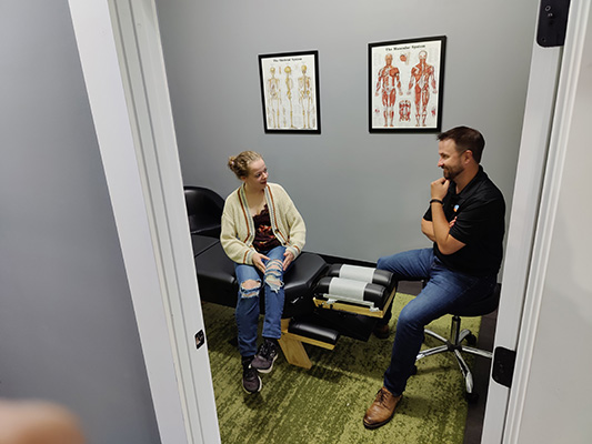 Chiropractic Bozeman MT Consult With Patient